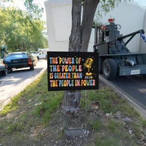 The Power Of The People Is Greater Than The People In Power, Cory Booker Yard Sign